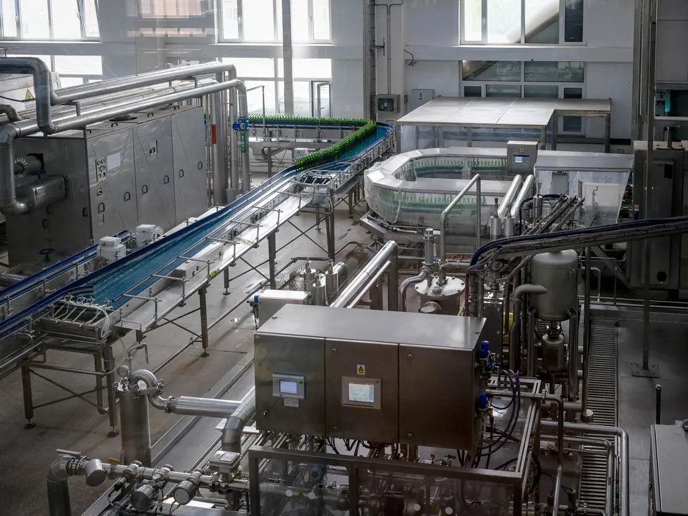 Automated production line with conveyors and industrial machinery